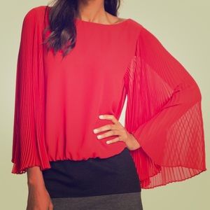 Vince Camuto red pleaded sleeve fold over